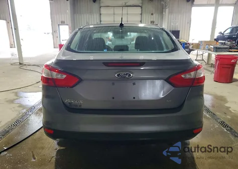 2014 Ford Focus Se z USA, uszkodzony, nr VIN 1FADP3F20EL409151